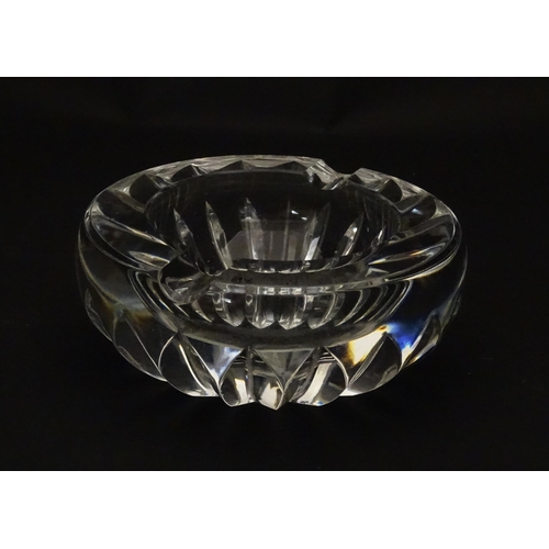 244 - A Baccarat ashtray of circular form. Marked under Baccarat France. Approx. 4 1/4