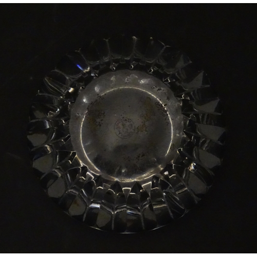 244 - A Baccarat ashtray of circular form. Marked under Baccarat France. Approx. 4 1/4