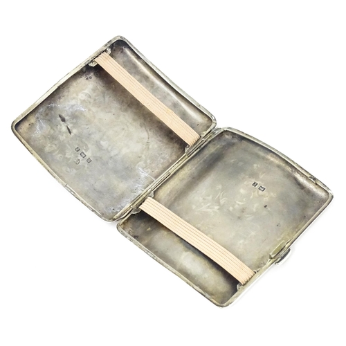 299 - WITHDRAWN FROM AUCTION -  Apologies for any inconvenience caused**A silver cigarette case of shaped ... 