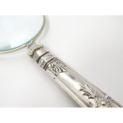 344 - A silver handled magnifying glass. Approx. 6