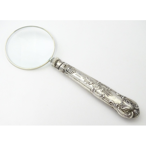 344 - A silver handled magnifying glass. Approx. 6