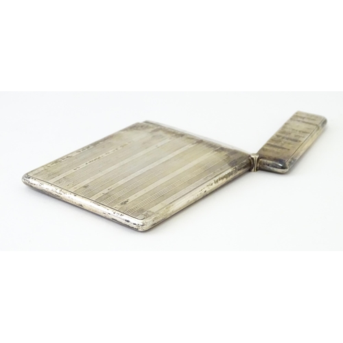 451 - A silver card case with banded engine turned decoration. Hallmarked Birmingham 1920 maker William Ne... 