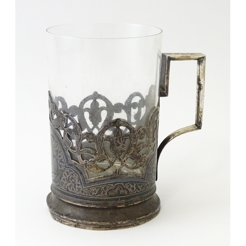 470 - A Continental .835 silver tisane cup holder with niello decoration. Possibly Russian. The whole appr... 