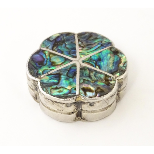 480 - A Mexican silver pill box with inlaid abalone detail. Approx. 1 1/4