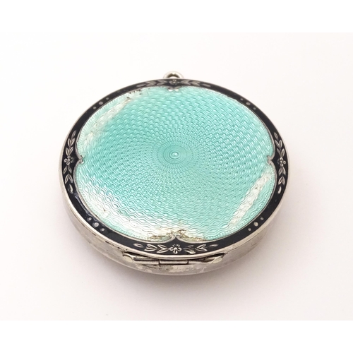 491 - An Art Deco silver compact with guilloche enamel decoration to lid, hallmarked Birmingham 1926, make... 