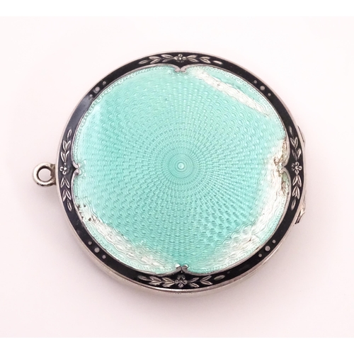 491 - An Art Deco silver compact with guilloche enamel decoration to lid, hallmarked Birmingham 1926, make... 