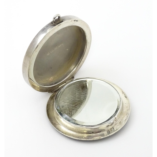 491 - An Art Deco silver compact with guilloche enamel decoration to lid, hallmarked Birmingham 1926, make... 