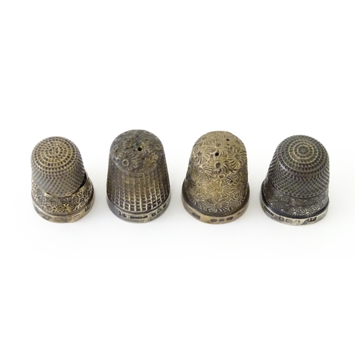 501 - Four assorted silver thimbles to include an example hallmarked Birmingham 1901 maker Henry Griffith ... 