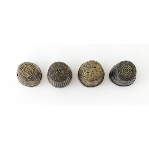 501 - Four assorted silver thimbles to include an example hallmarked Birmingham 1901 maker Henry Griffith ... 