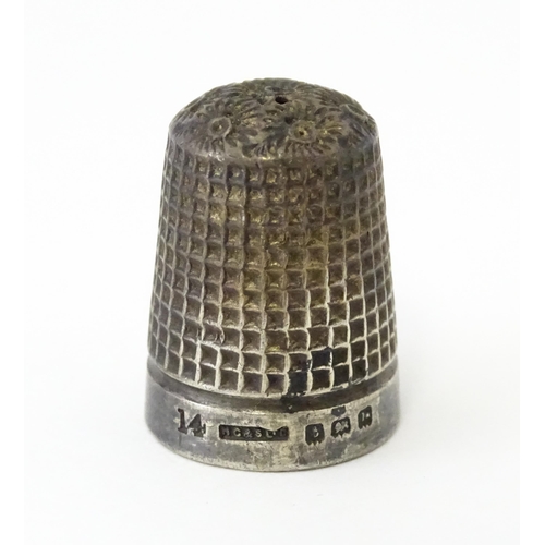 501 - Four assorted silver thimbles to include an example hallmarked Birmingham 1901 maker Henry Griffith ... 