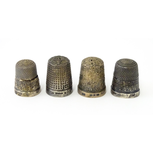 501 - Four assorted silver thimbles to include an example hallmarked Birmingham 1901 maker Henry Griffith ... 