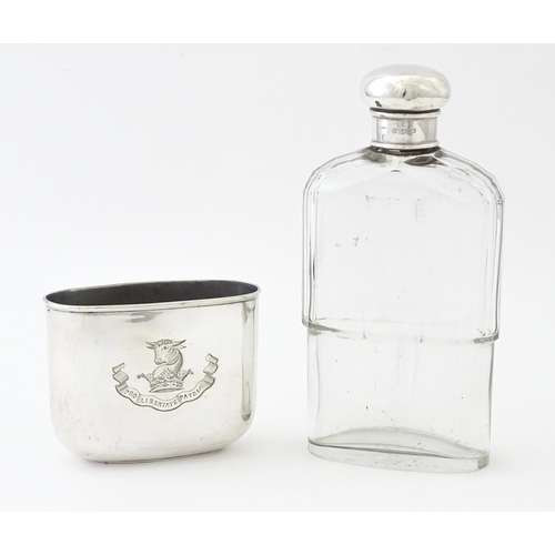 502 - A glass hip flask with silver top, with associated silver beaker lower hallmarked Sheffield 1894, ma... 