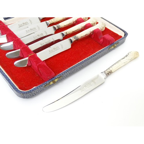 553 - Two cased set of six silver handled tea knives, hallmarked Sheffield 1979, maker Harrison Brothers. ... 