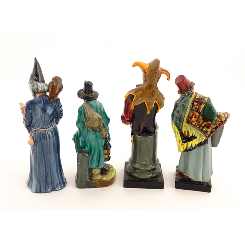 104 - Four Royal Doulton figures comprising The Jester HN2016, The Wizard HN2877, The Mask Seller HN2103, ... 