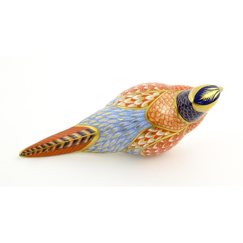 107 - A Royal Crown Derby paperweight modelled as a pheasant. Marked under, with gold stopper. Approx. 6 3... 