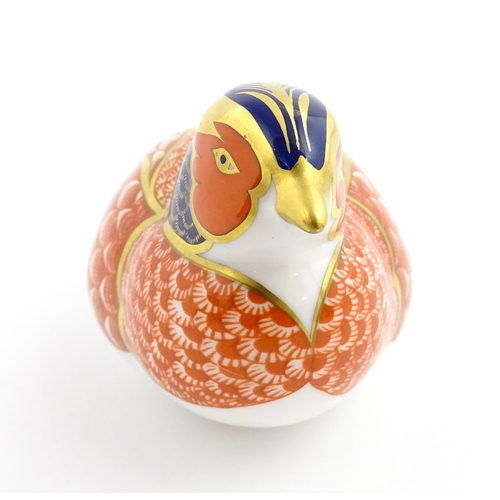 107 - A Royal Crown Derby paperweight modelled as a pheasant. Marked under, with gold stopper. Approx. 6 3... 