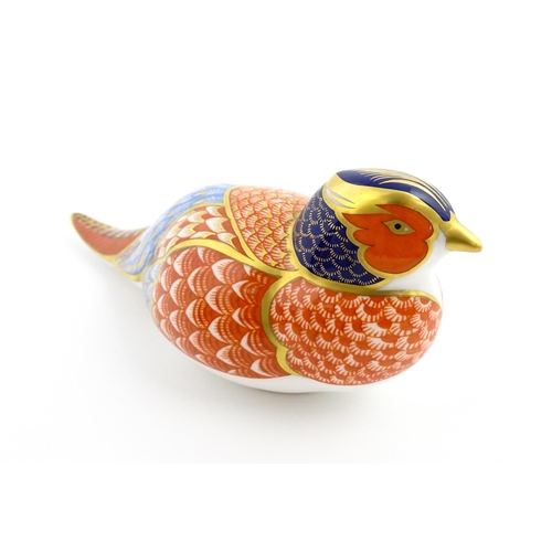 107 - A Royal Crown Derby paperweight modelled as a pheasant. Marked under, with gold stopper. Approx. 6 3... 