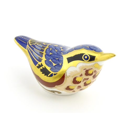 108 - A Royal Crown Derby paperweight modelled as a Nuthatch. Marked under. Approx. 4 1/2