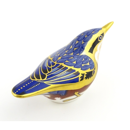 108 - A Royal Crown Derby paperweight modelled as a Nuthatch. Marked under. Approx. 4 1/2