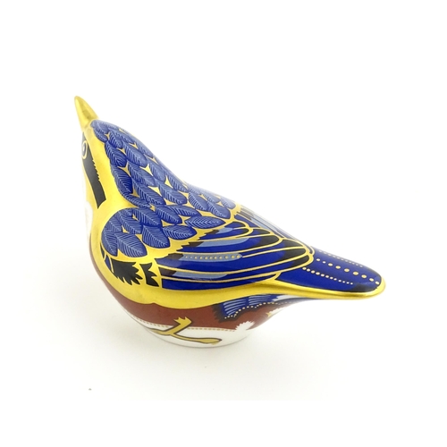 108 - A Royal Crown Derby paperweight modelled as a Nuthatch. Marked under. Approx. 4 1/2