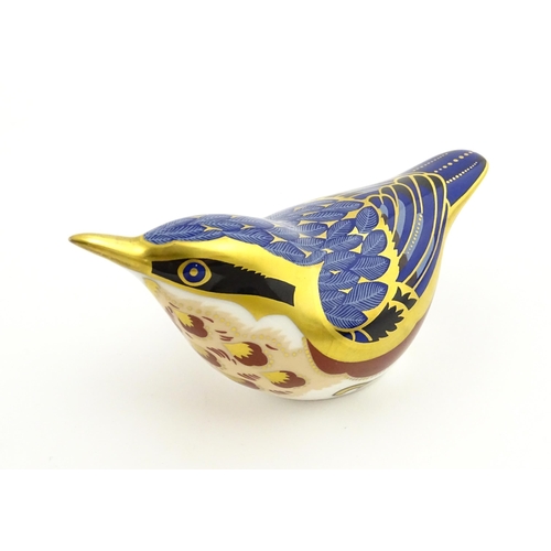 108 - A Royal Crown Derby paperweight modelled as a Nuthatch. Marked under. Approx. 4 1/2