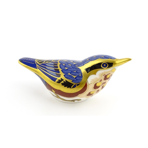 108 - A Royal Crown Derby paperweight modelled as a Nuthatch. Marked under. Approx. 4 1/2