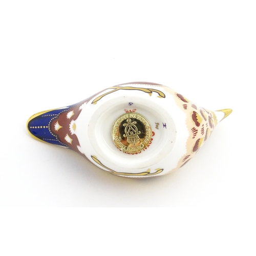 108 - A Royal Crown Derby paperweight modelled as a Nuthatch. Marked under. Approx. 4 1/2