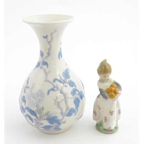 111 - A Lladro vase with flared rim decorated with sparrow birds and flowers, no. 4691.3. Marked under. To... 