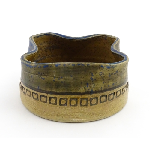 126 - A Swedish Alingas Keramik planter / jardiniere of shaped form with banded decoration. Marked under a... 