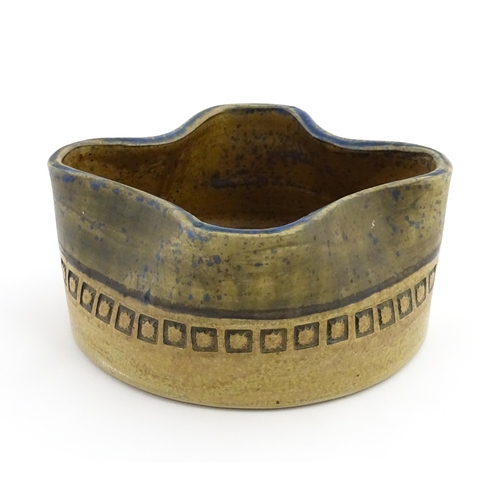 126 - A Swedish Alingas Keramik planter / jardiniere of shaped form with banded decoration. Marked under a... 