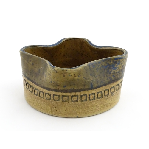 126 - A Swedish Alingas Keramik planter / jardiniere of shaped form with banded decoration. Marked under a... 