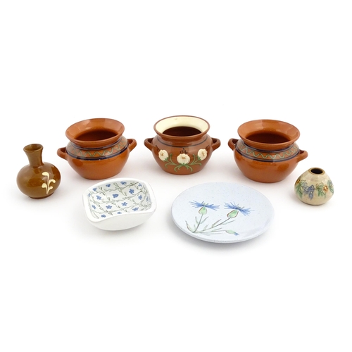 133 - A quantity of assorted ceramics to include three Swedish Nittsjo twin handled pots, a plate with han... 