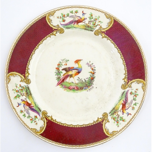 140 - A Royal Crown Derby plate decorated in the Olde Aves pattern. Together with three Myott plates and a... 