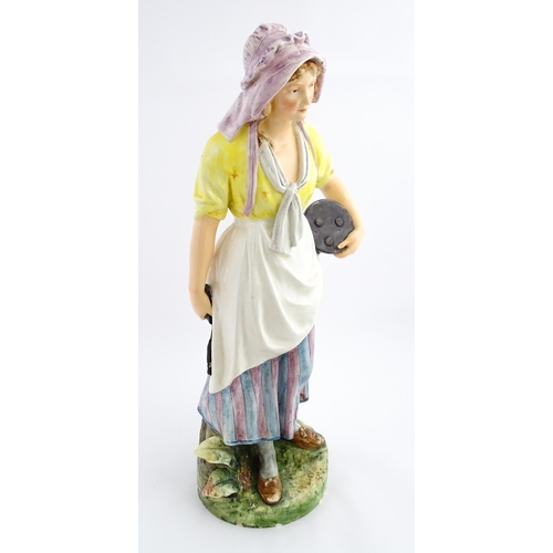 143 - A large Continental model of a milk maid with stool. Impressed under 11058. Approx. 37 1/2