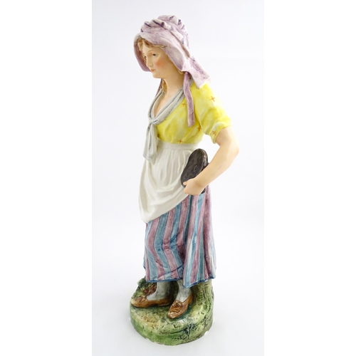 143 - A large Continental model of a milk maid with stool. Impressed under 11058. Approx. 37 1/2