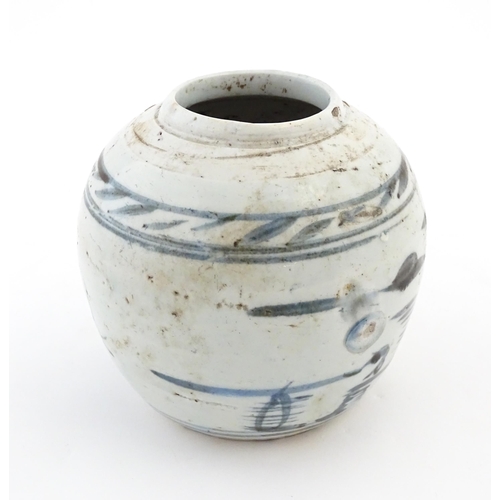 16 - A Chinese blue and white jar with brushwork decoration. Approx. 4 3/4