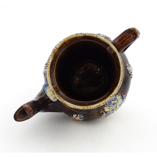 162 - A Victorian Measham bargeware teapot with teapot finial to lid, decorated with flowers and foliage, ... 