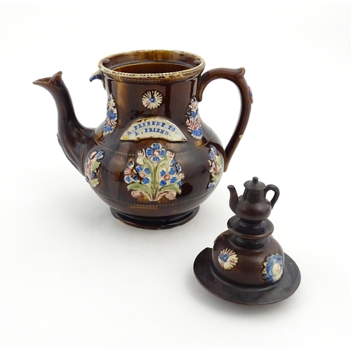 162 - A Victorian Measham bargeware teapot with teapot finial to lid, decorated with flowers and foliage, ... 