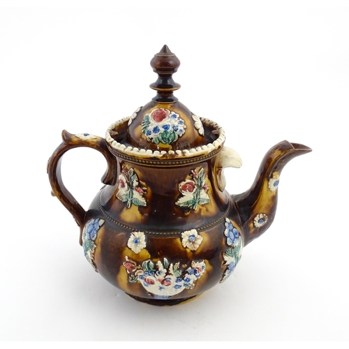 171 - A Victorian Measham bargeware teapot decorated with flowers and foliage, bearing plaque titled Mr & ... 