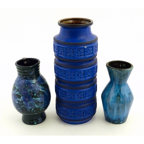 179 - Three West German vases to include a blue Scheurich vase of cylindrical form wth banded relief detai... 