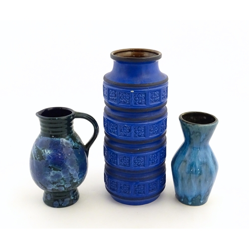 179 - Three West German vases to include a blue Scheurich vase of cylindrical form wth banded relief detai... 