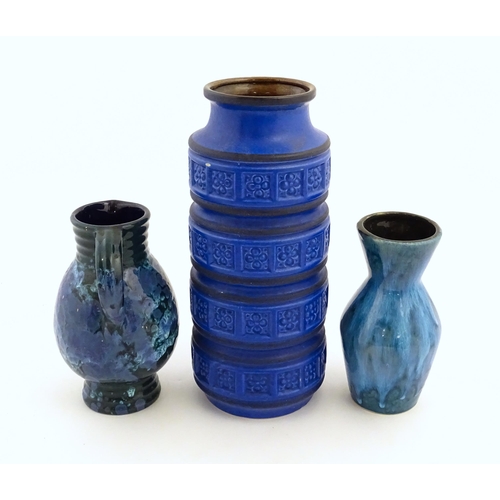 179 - Three West German vases to include a blue Scheurich vase of cylindrical form wth banded relief detai... 