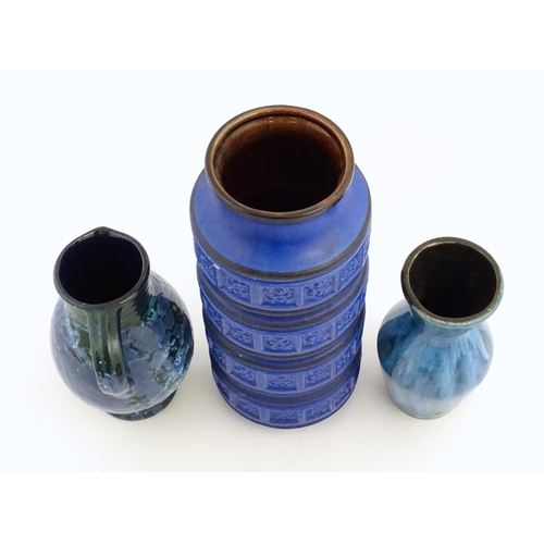 179 - Three West German vases to include a blue Scheurich vase of cylindrical form wth banded relief detai... 