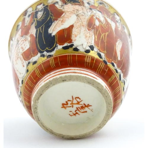 19 - An Oriental teapot of squared form with banded decoration. Together with a Japanese Kutani sake cup ... 