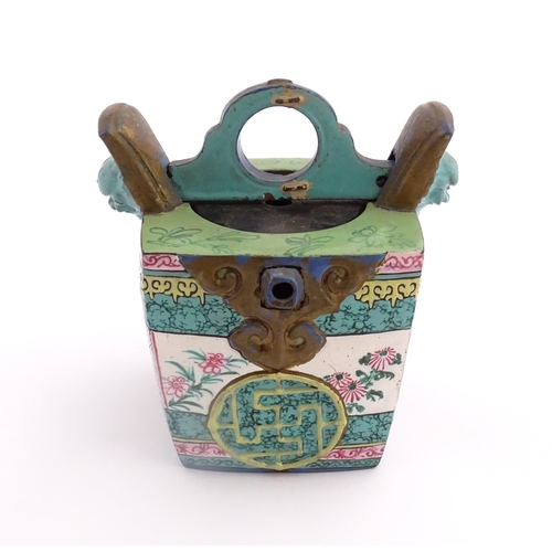 19 - An Oriental teapot of squared form with banded decoration. Together with a Japanese Kutani sake cup ... 