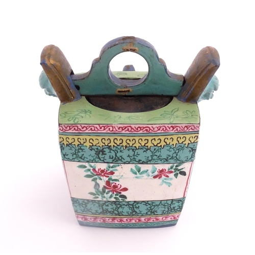 19 - An Oriental teapot of squared form with banded decoration. Together with a Japanese Kutani sake cup ... 