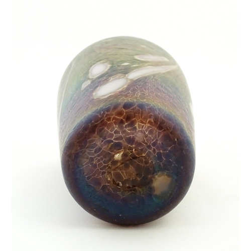 223 - An art glass vase of tapering form with iridescent detail. Approx. 5 3/4