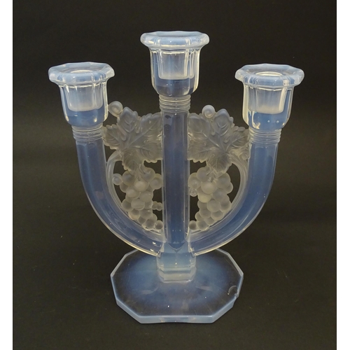 236 - An Art Deco opalescent glass candlestick by Barolac Czecho Slovakia.  Approx. 9