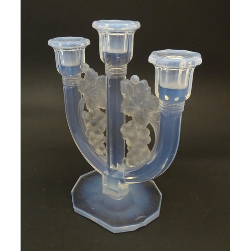 236 - An Art Deco opalescent glass candlestick by Barolac Czecho Slovakia.  Approx. 9