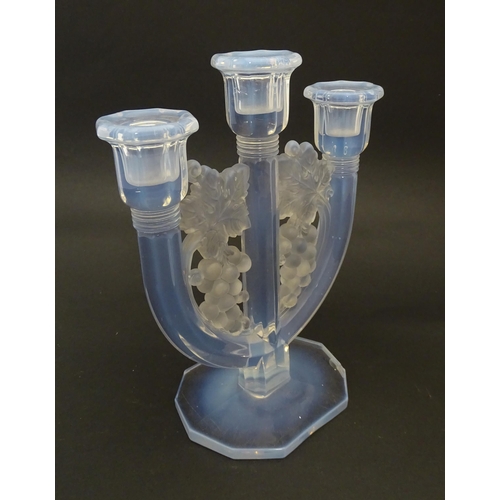 236 - An Art Deco opalescent glass candlestick by Barolac Czecho Slovakia.  Approx. 9